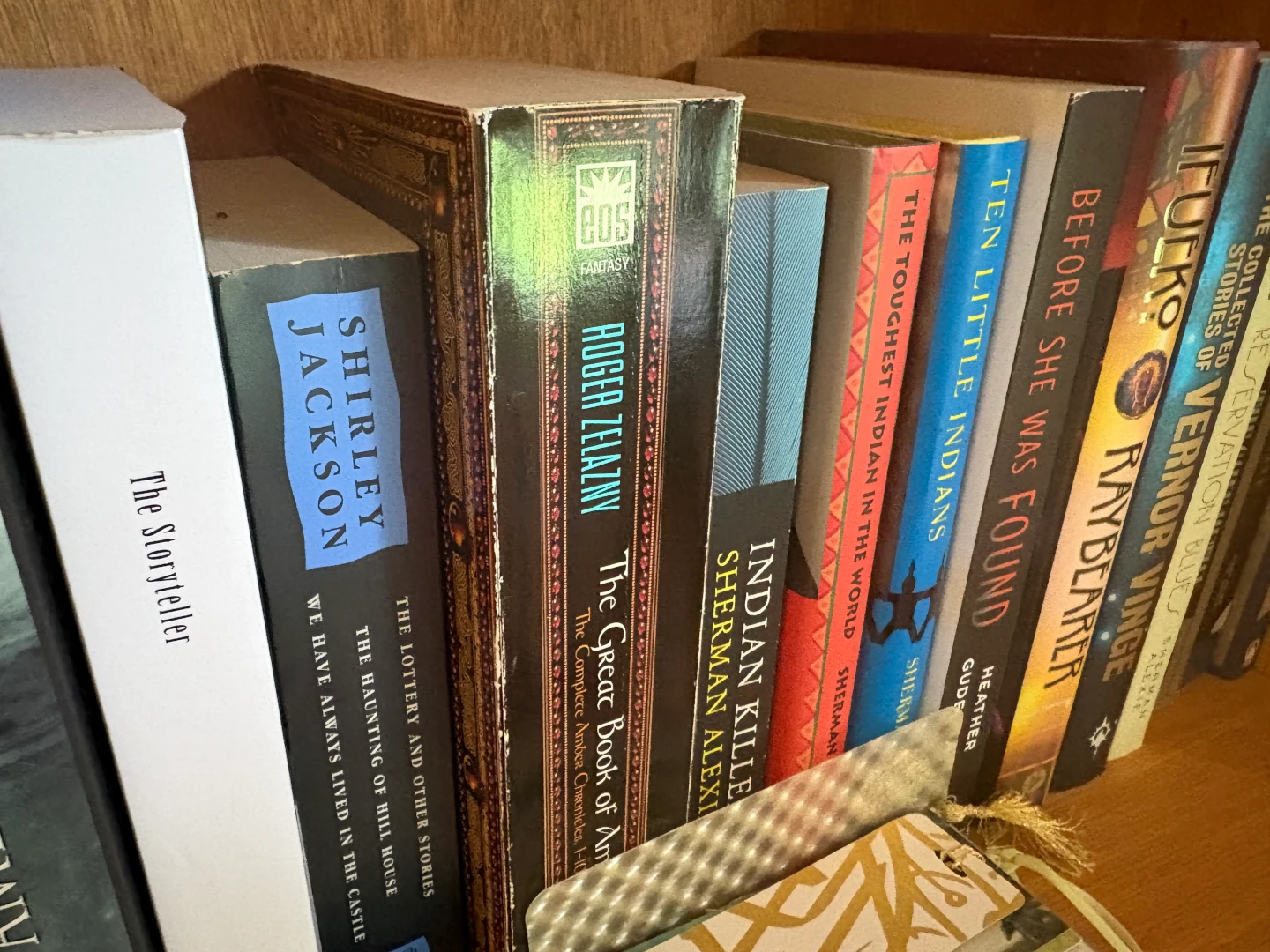 A random section from my bookshelf. Most of these are hardbacks or tradde paperbacks Sadly, a lot of my oldest paperbacks didn't survive our last move.